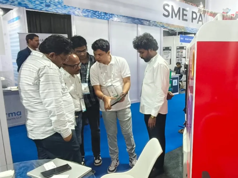 Visitors interacting at IFAT 2025 booth